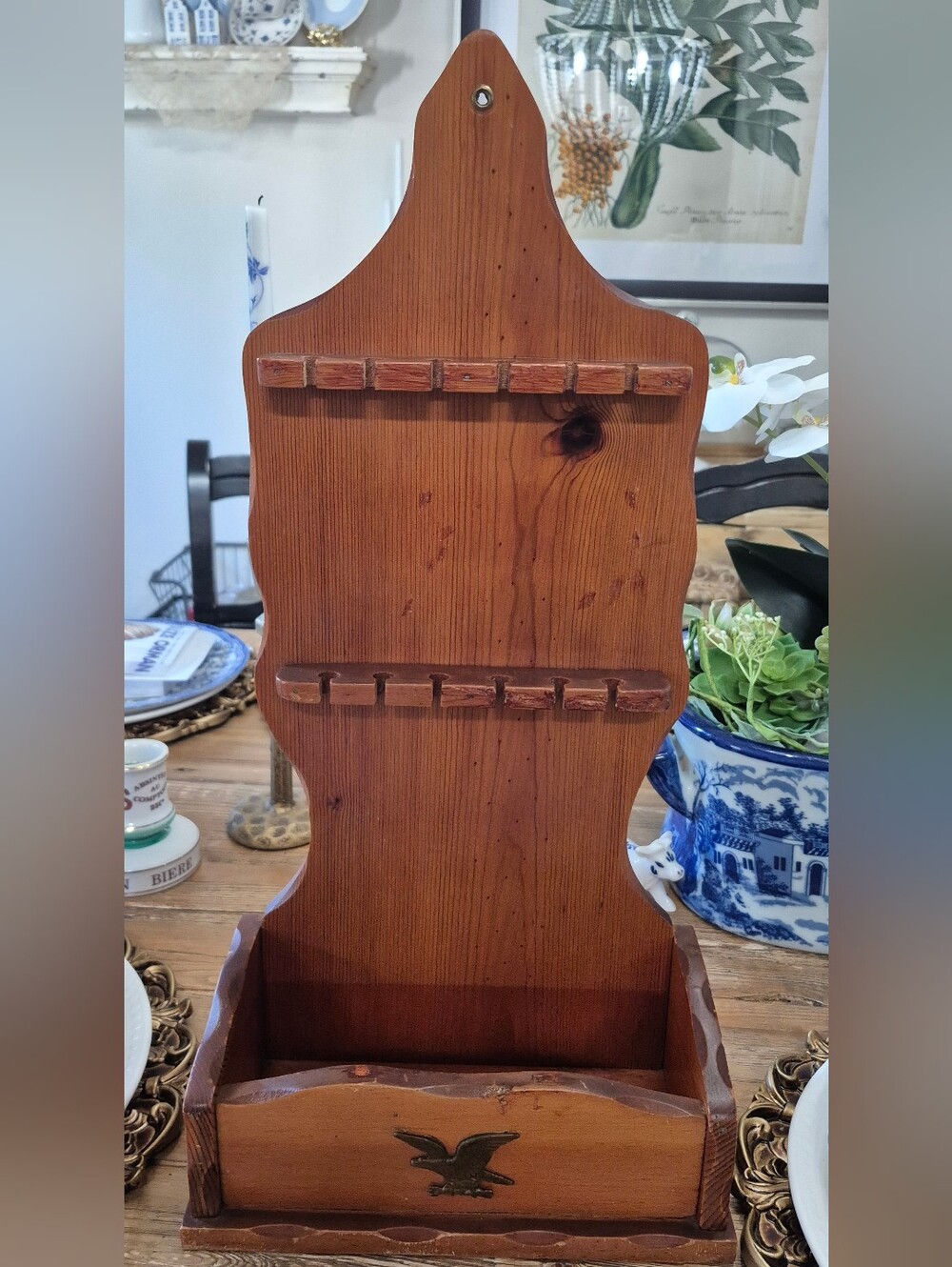 Vintage wooden 12-spoon display wall rack with an Americana Federal Eagle
